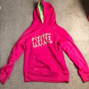 A pink and green nike sweatshirt!